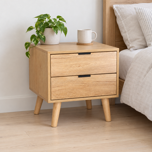 Artiss Pine Finish Bedside Table with Two Drawers, 50 cm shown in a home setting