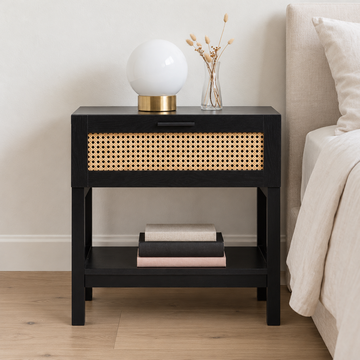 Casa Decor Tulum Black Rattan Bedside Table shown in a home setting