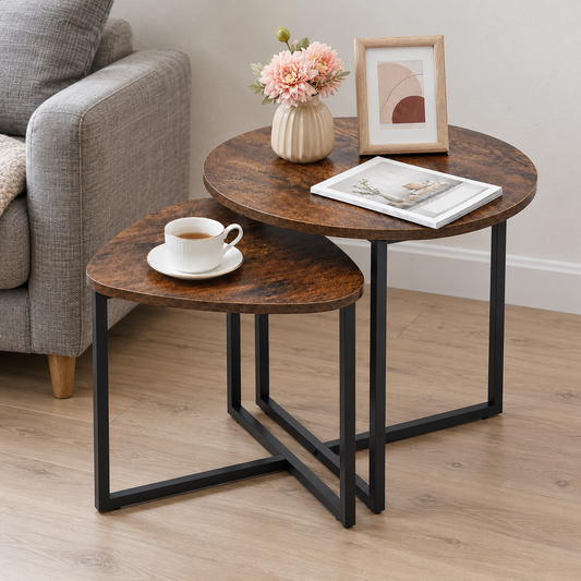 Rustic brown nesting side tables beside a grey sofa in a living room