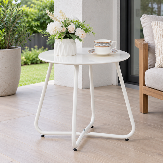 White Round Metal Outdoor Side Table shown in a home setting